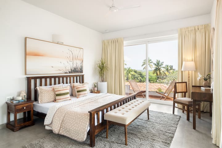 Featuring bottom-to-ceiling glass sliding doors, a thoughtfully designed workstation, and beautifully styled interiors: crafted with space, comfort, and aesthetics in mind.
