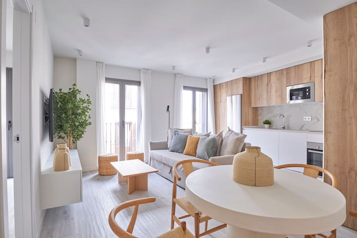 Modern apartment with balconies and natural light