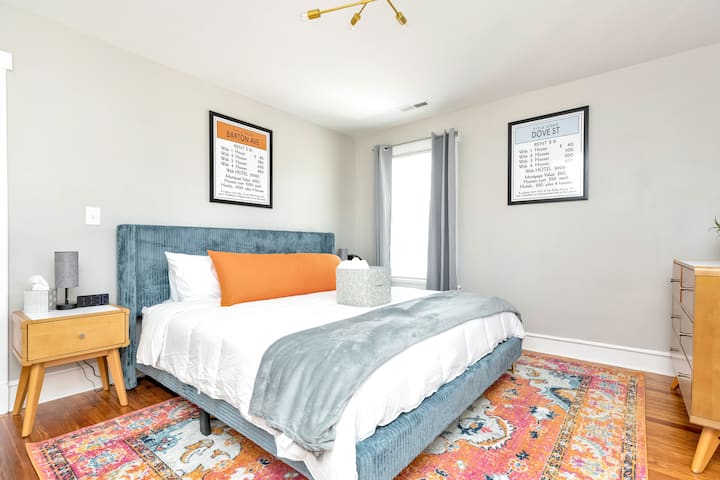  “Barton Ave Retreat”
 Stretch out in the king bed with a plush throw and stylish headboard, enjoy a private balcony for fresh air, and unwind with your own Roku TV. A chest of drawers completes the perfect stay.

