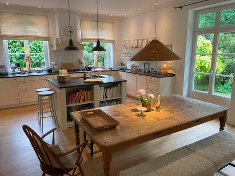 Large country house with a park-like garden