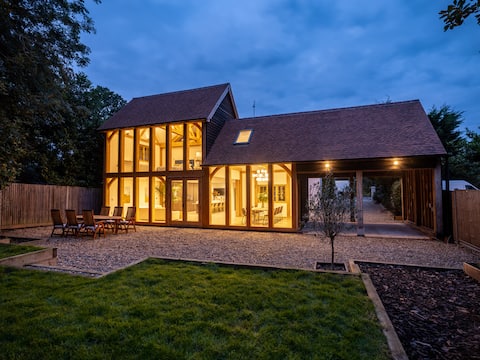 Stunning Oak Glass House London Train Hot Tub