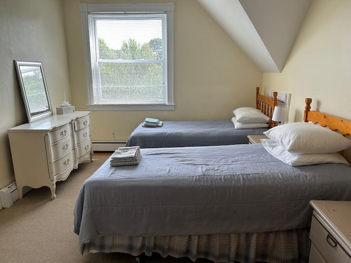 Camas individuales en el tercer piso