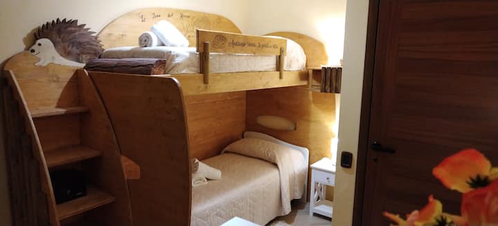 Strawberry room - original "hedge" themed bedroom with bunk beds.