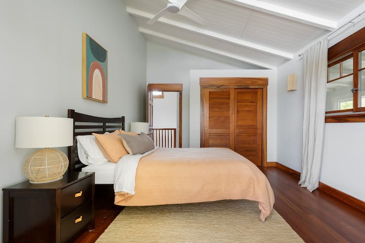 The Banyan House's upstairs includes 3 bedrooms and a full bath. Each bedroom has a private entrance to the upper lanai. 