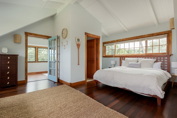 The upstairs Mango House loft includes a king bed, trundle bed (2 twins) and a half bath. A doorway leads from the loft to our gorgeous sleeping porch. 
