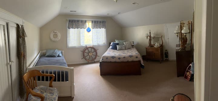 Nautical room.  Full size bed.  New 2022 Trundle bed.  Sleeps 4 guests