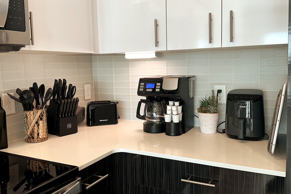 Coffee maker prepares coffee in a 12-cup carafe and takes single serve coffee grounds or K-cup pods. We even provide a small start kit of K-cups and creamers.