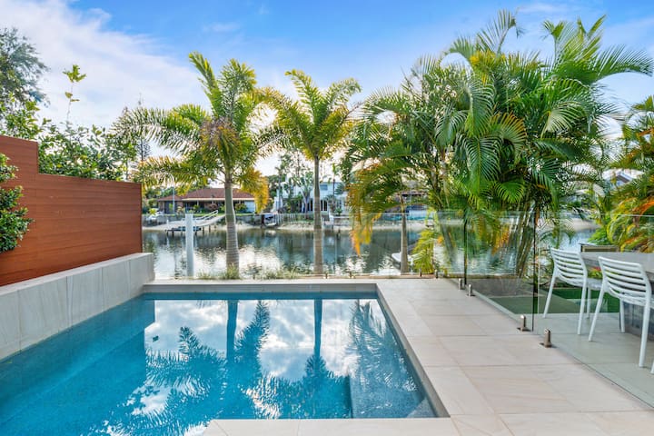 Exclusive waterfront oasis w/private beach & pool