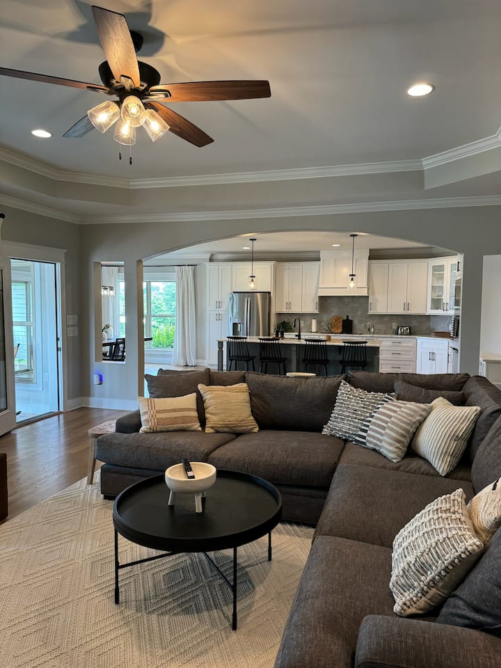 Large great room with lake views throughout. 