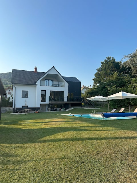 Modern house with hot tub, pool and sauna