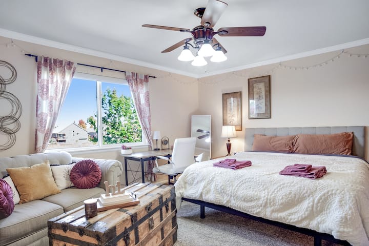 This room offers a cozy reading corner, office space for work, and room darkening shades. The bed is extremely comfortable and gets many compliments!