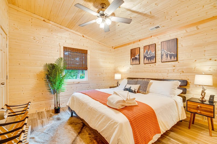 Bedroom 2 features a spacious king-size bed, providing comfort and a restful night’s sleep.