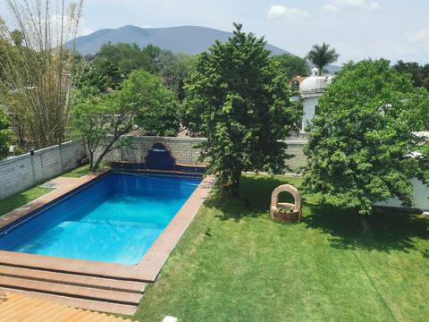 A spacious house, with a huge pool.