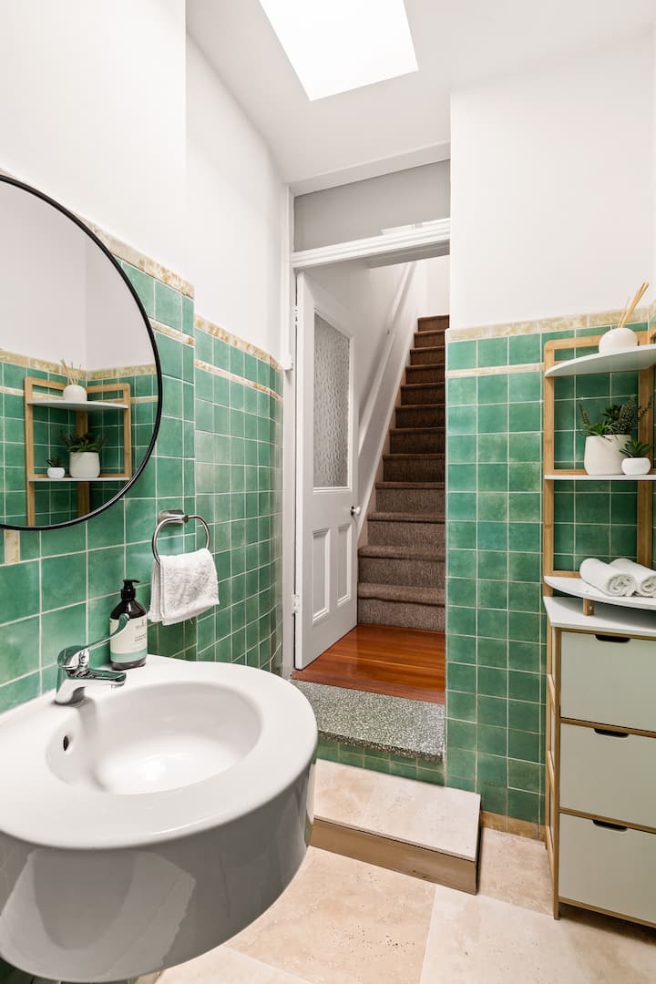 With beautiful natural light from the skylight,  the stylish bathroom offers everything you need for a refreshing start to your day. Experience comfort and elegance during your stay.