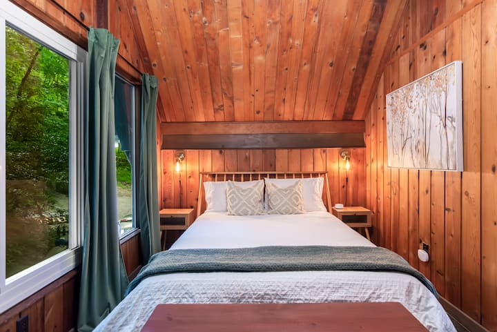 Queen bed upstairs, blackout curtains, and sound machine