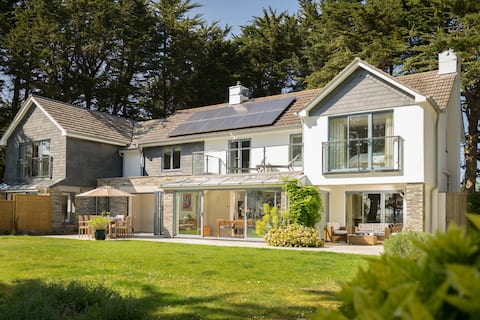 Just above the beach with stunning estuary views