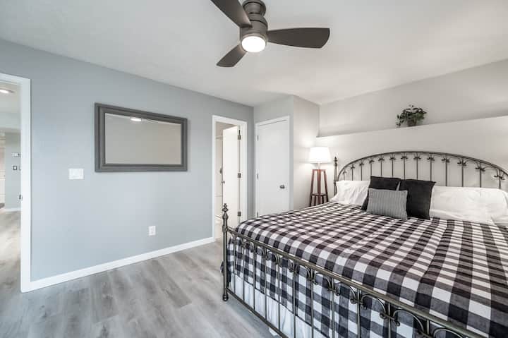 Unit 1 master bedroom, king bed, ensuite bathroom with walk in shower.