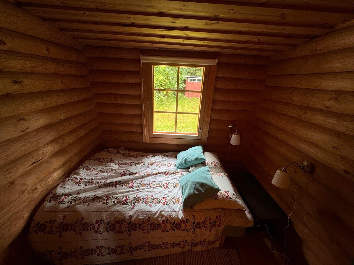 Queen Bed, Guests must bring their own sheets.