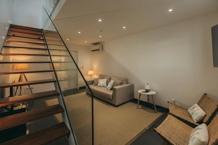 Sala de estar con sofá cama