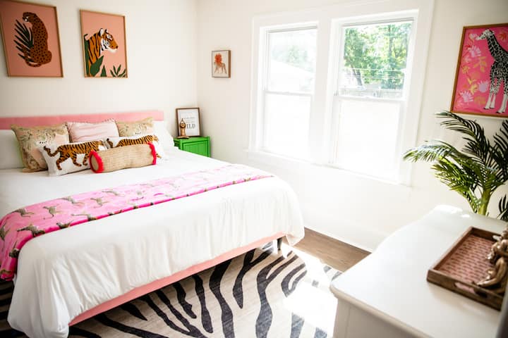King bed, desk, ceiling fan, room darkening curtains