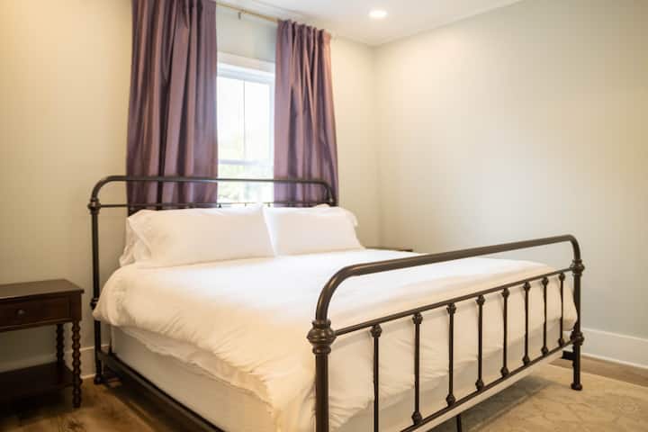 Private bedroom with King bed and attached bathroom.