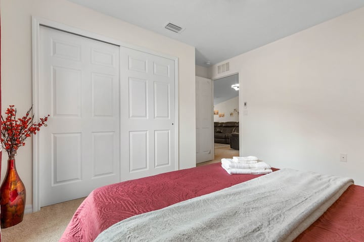 The dark red bedroom has just a hint of Asian decor.  It's so hard to choose our favorite bedroom as they are all unique to each other.  