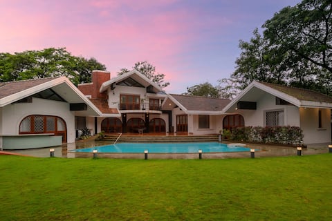 StayVista at Gulmohar Gardens w/ Pool, Gazebo, BBQ