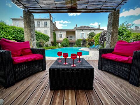 Stunning French townhouse on river with pool.