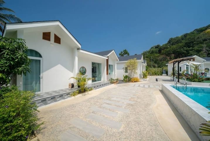 Tropical Oasis Aoyon Beach House managed Airbnb listing 1