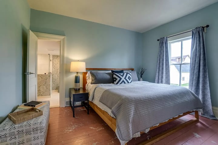 Bedroom 5 with queen bed and en suite bathroom located on the second floor