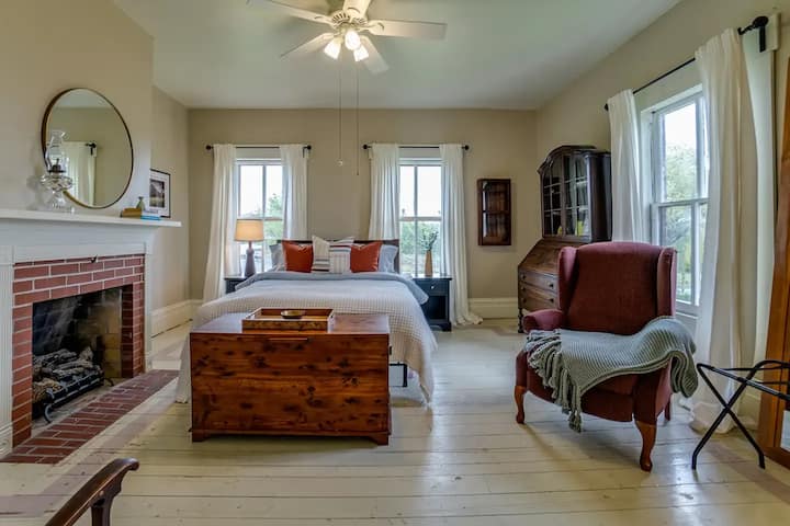 Bedroom 4 with king bed and en suite bathroom located on the second floor