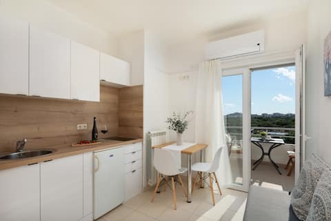 Apartments Tihi with terrace and sea view III