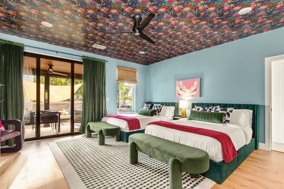 Colorful, cozy, and ready for a peaceful night's sleep. Our beautifully designed bedroom is the perfect retreat. (Located downstairs).