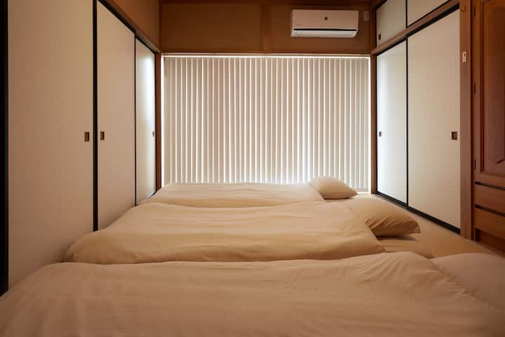 Upstairs bedroom.There is three pairs of futon.