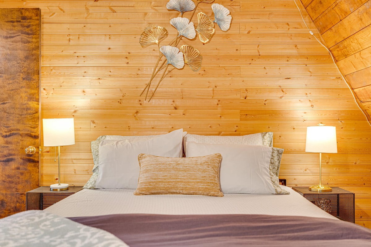 1st floor Queen bedroom. Note: The bedroom  layout was updated to maximize comfort & space. Added portable clothes rack & clothes bin and extra lounge chair (not pictured here). The utility closet can store luggages only. 