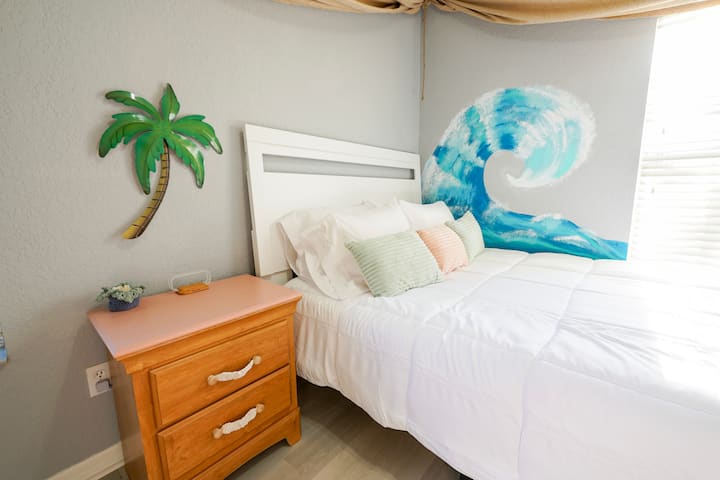 This queen bed calls you after a long day of vacationing! 