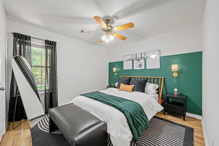 Get ready in this stylish bedroom before your day's adventure!