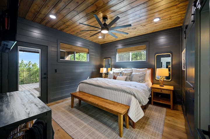 King bedroom #1 with mattress topper, comfortable and cozy designer bedding.