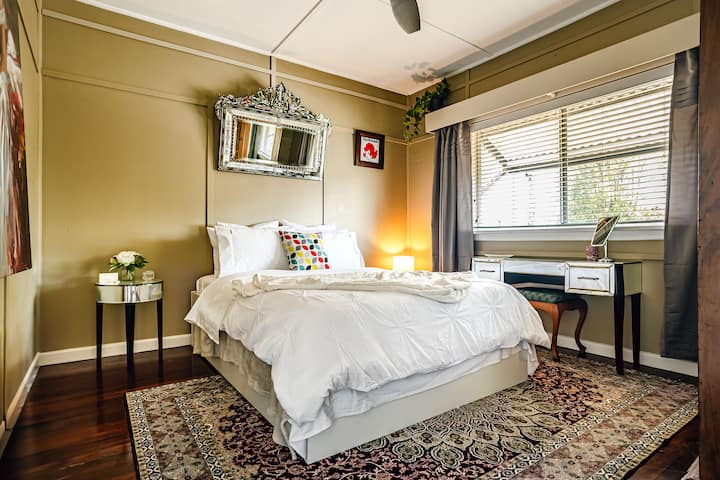 The 'Venetian Room' was names after this gorgeous rectangular Venetian mirror I had shipped back from Vienna, reflecting light and elegance into the bedroom. The other two mirrored pieces matches the European style I love.