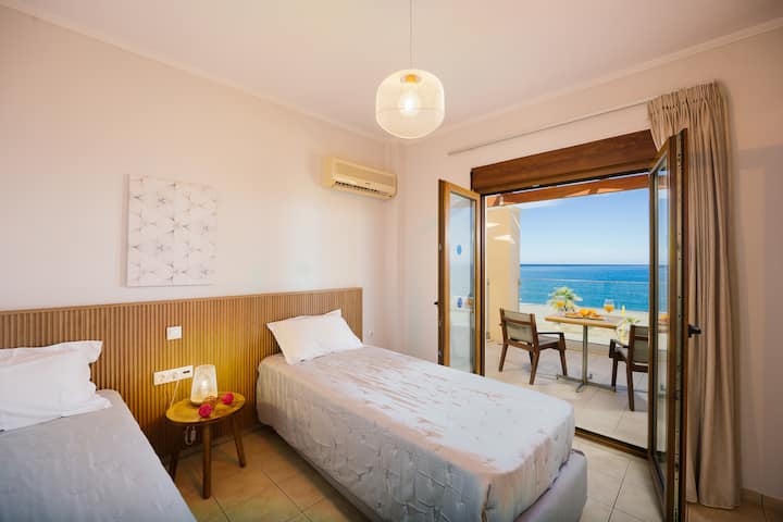 Beautiful twin bedroom with seaview
