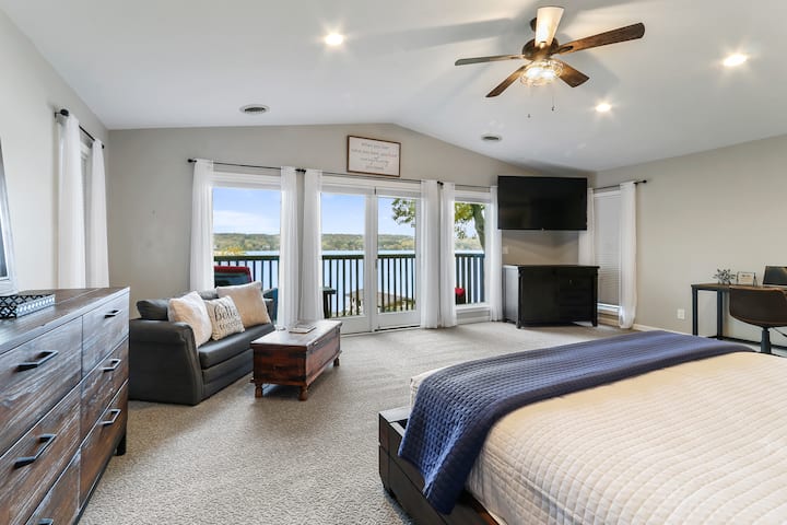 2nd floor master bedroom with shared access to bathroom and private balcony overlooking Lake Como.