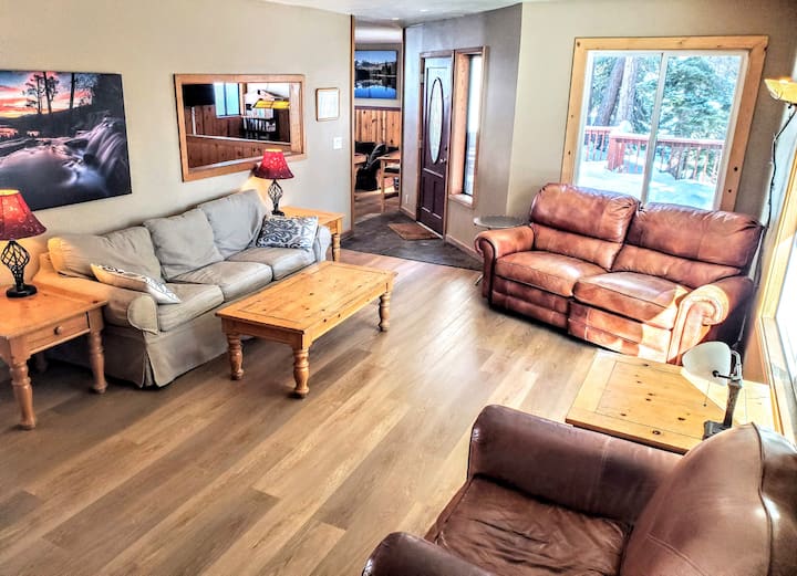 Savor Spectacular Views of Heavenly Ski Area, Tahoe Rim Trail, National Forest, and Several Mountain Ranges from this Luxurious Home with Hot Tub, Pool Table, and Redwood Decks, Perched on a Mountainside Minutes from Lake Tahoe. Queen Sofa Bed, Roku