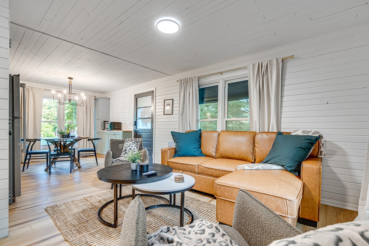 Living Room: Bright and inviting with stylish decor, perfect for relaxation or game night!