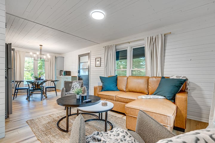 Living Room: Bright and inviting with stylish decor, perfect for relaxation or game night!