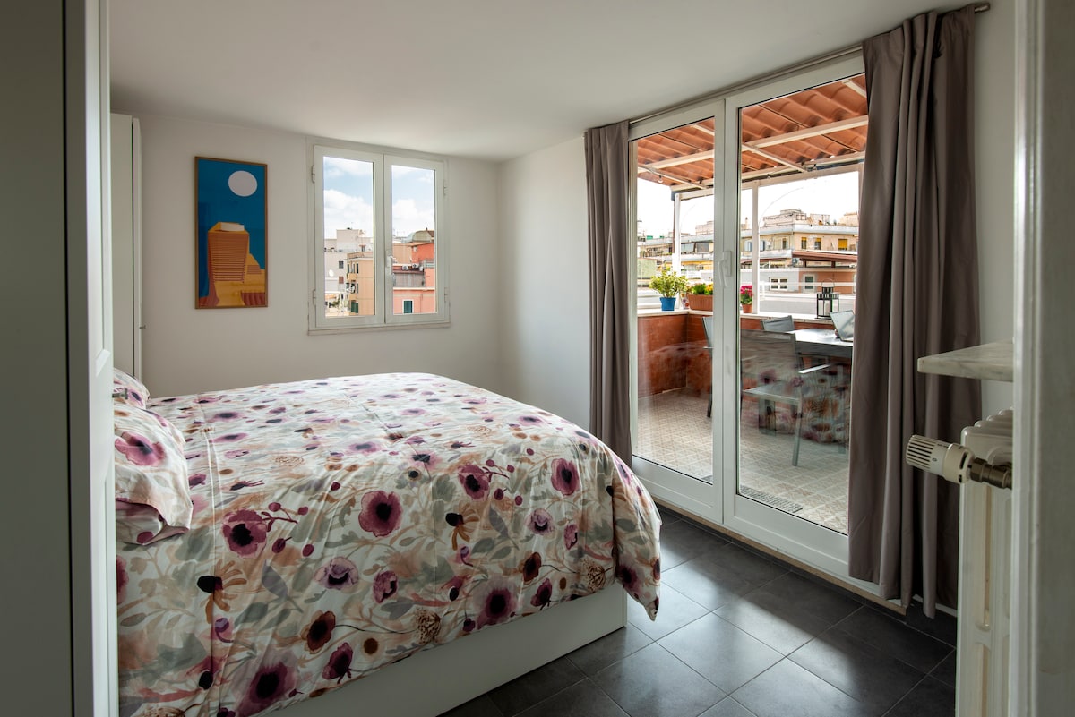 Chambre avec accès à la terrasse