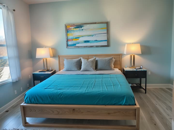 StaysProのエレガントな寝室でスタイリッシュに眠り、落ち着いた夜と新鮮な朝のための穏やかなリトリートを提供します
