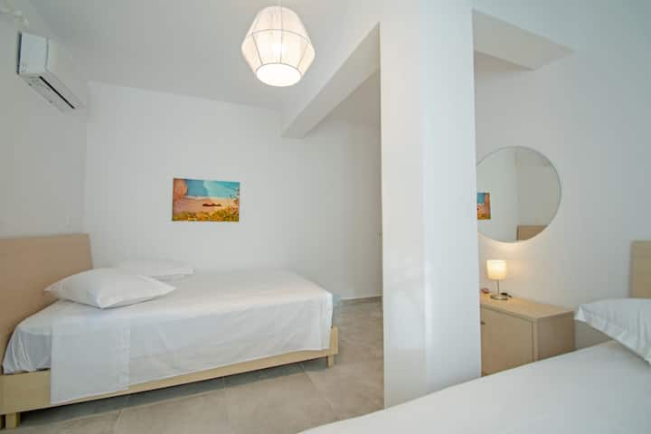 Bedroom 4 - Double Bedroom, situated on the ground floor, TWO DOUBLE beds, air conditioning, TV, closet