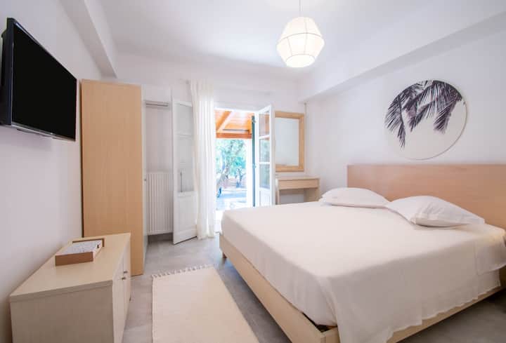 Bedroom 2 - Master Bedroom, situated on ground floor, King size bed, with access to bathroom, air conditioning, closet, TV