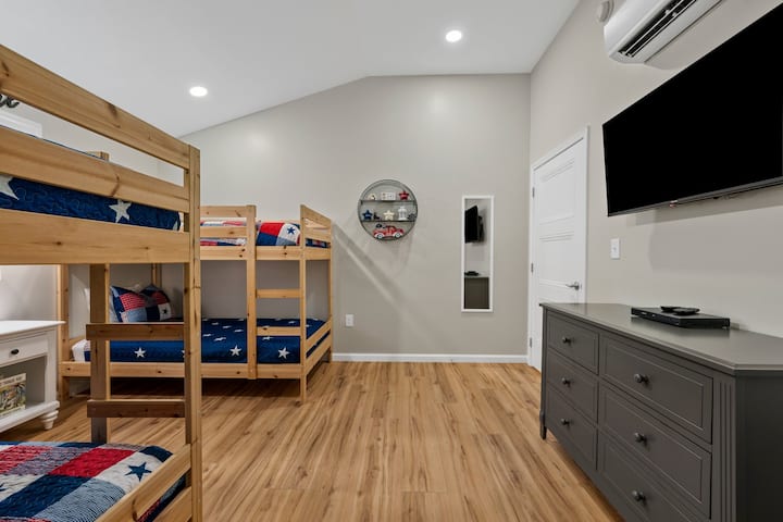 Bunk room located on upper floor. 