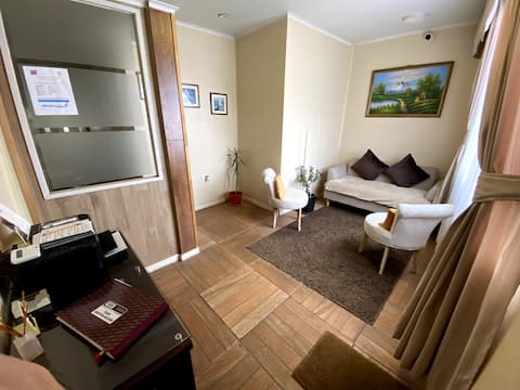 Triple room Hostal Quimey Ruca